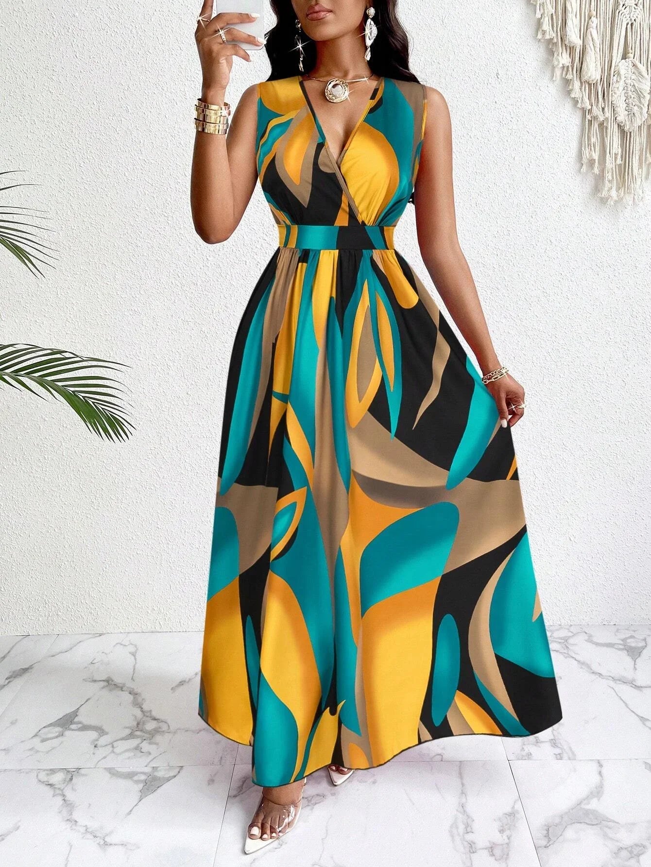 Women's Sleeveless V-Neck Floor-Length Dress with Abstract Prints - Stylish Attire for Beach and Casual Events
